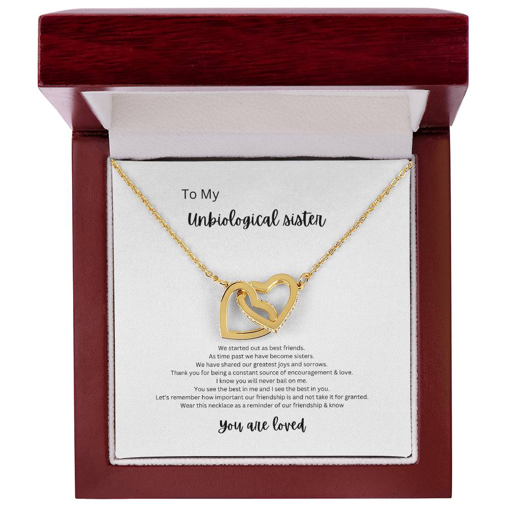 un-biological sister, you are loved! Interlocking hearts necklace