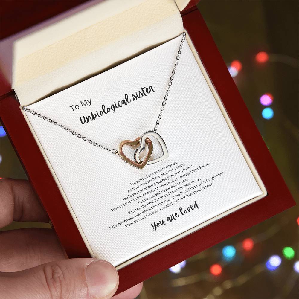un-biological sister, you are loved! Interlocking hearts necklace